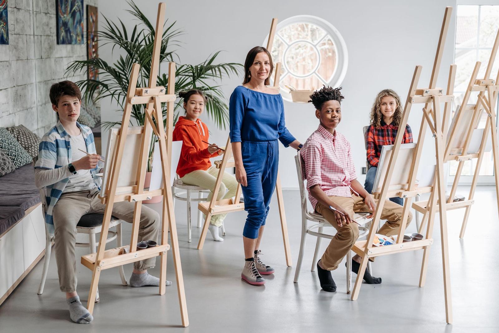 Kids Together with Their Teacher in an Art Class